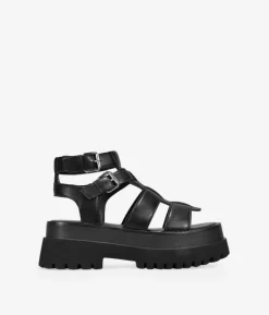 Fashion Bosanova Sandalias de plataforma negras con suela track y hebilla