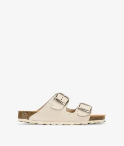 New Bosanova Sandalias planas beige en piel con tachuelas