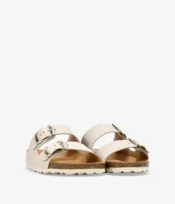 New Bosanova Sandalias planas beige en piel con tachuelas